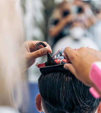 photo-with-copy-space-of-a-hairdresser-using-a-com-2024-10-17-00-07-03-utc